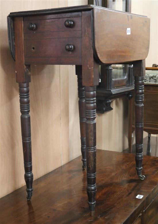 A Regency mahogany work table on ring-turned legs W.47cm